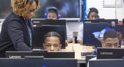 Teacher and students in the Computer Science class 