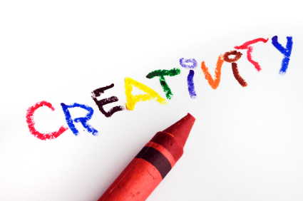 a red crayon with the word creativitiy written in different colors 
