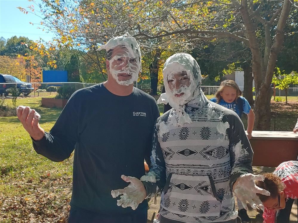 Teachers with pie on their faces