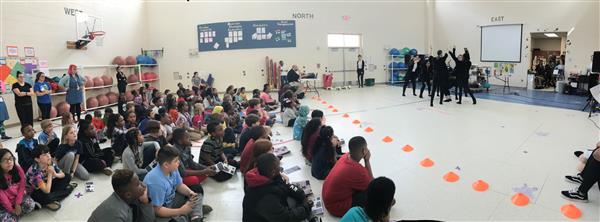 Students watching performance