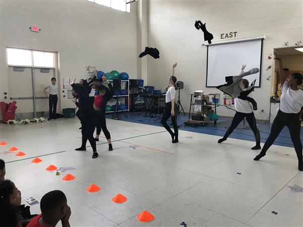 Student performers dancing